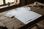 Basic blank t-shirt laying on a workbench